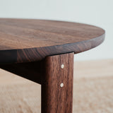 Round walnut coffee table Ritual. 